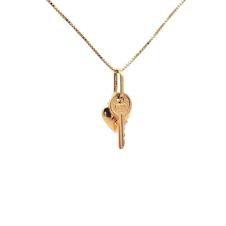 Dije diseño llave y corazón
