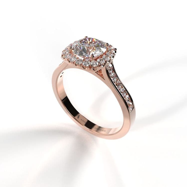 Anillo halo amberes 0,60 cts al carre