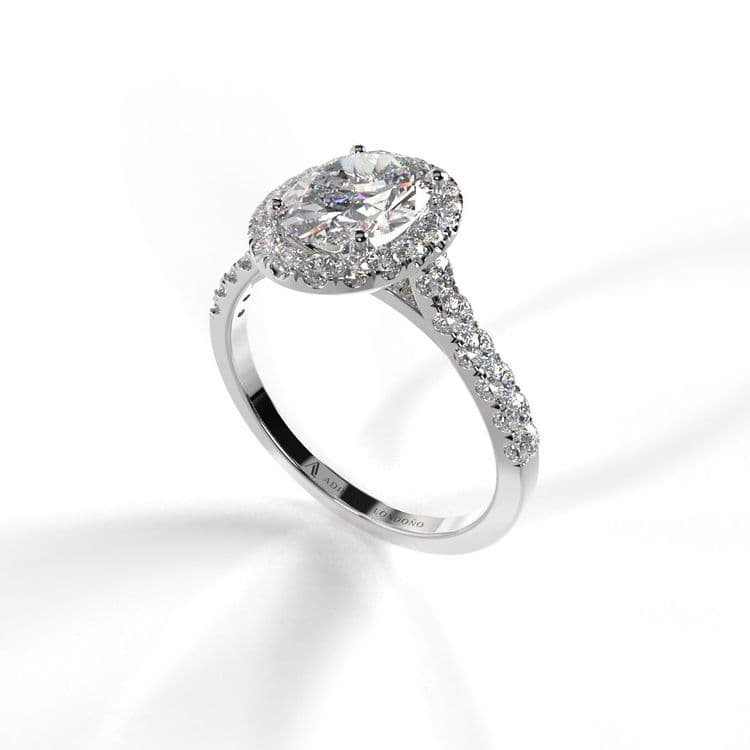Anillo halo paris 0,60 cts al frances