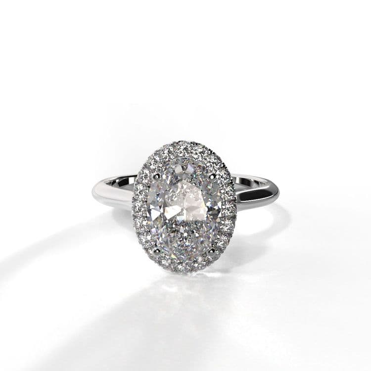 Anillo halo paris 0,60 cts