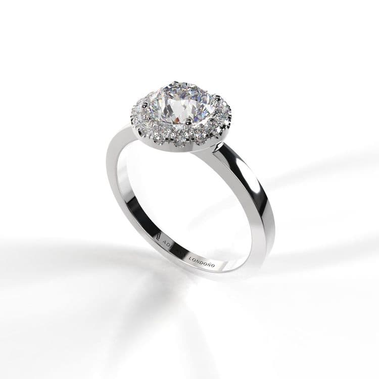Anillo halo luxemburgo 0,60 cts 