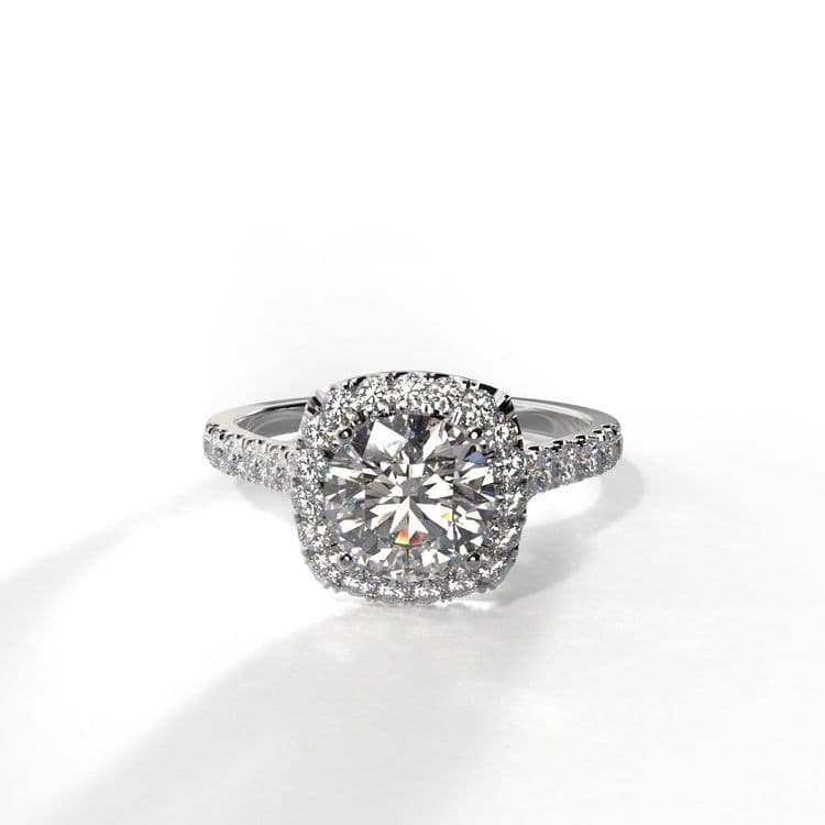 Anillo halo amberes 0,60 cts al frances