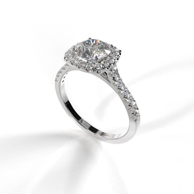 Anillo halo amberes 0,60 cts al frances