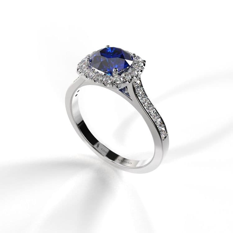Anillo halo amberes 0,60 cts a la banda